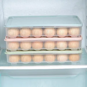 Clear stackable plastic egg storage container box with lid for refrigerator kitchen use.