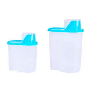 Transparent plastic food storage jar with blue lid, kitchen cereal container for dry goods.