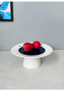 Modern minimalist ceramic cake stand, elegant radial design fruit plate and dessert display tray.