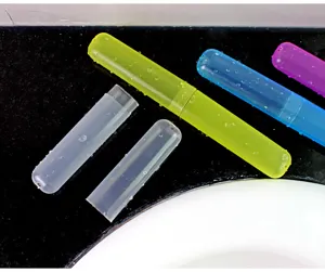 Portable toothbrush case detail showing frosted waterproof design in colorful options for travel storage.