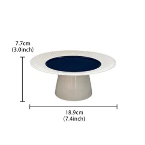 Modern minimalist ceramic cake stand with fluted rim and blue center, detail view, 18.9cm