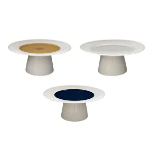 Modern minimalist ceramic cake stand with rayed rim and high base, ideal for fruit and dessert.