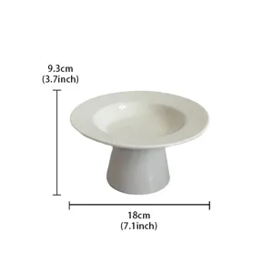 White ceramic high-footed fruit plate, minimalist dessert display stand for living room table.