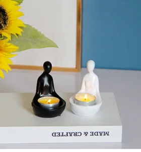 Bougeoir en resine abstrait petite figurine zen posture assise photophore decoration.