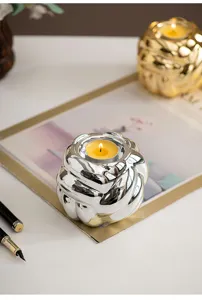 Portacandele in ceramica argentata a nodo, supporto moderno per lumino da tavolo e decorazioni casa.