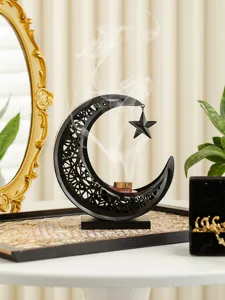 Middle Eastern metal crescent incense burner with hollow design, ideal for tabletop aroma decor.