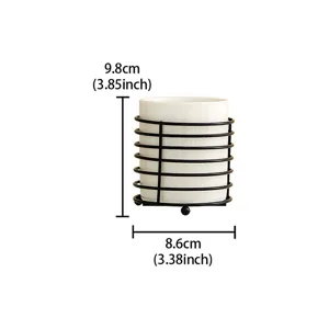 White ceramic makeup brush holder with black metal wire stand detail view, compact size.