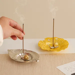 Creative metal snail leaf incense holder for tabletop decoration and soothing aromatherapy.