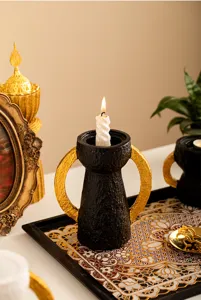 Portacandele in resina a due manici nero e oro stile orientale per decorazione tavola