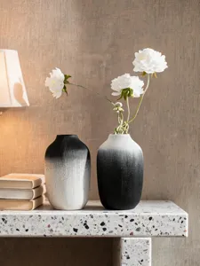 Minimalist black and white gradient resin vase detail, modern wabi-sabi home decor ornament.