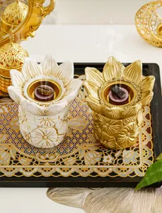 Creative lotus flower incense burner set, golden and white resin aroma diffuser holder for home.