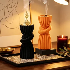 Unique knotted resin incense burner set, elegant home fragrance diffuser for tabletop decor.