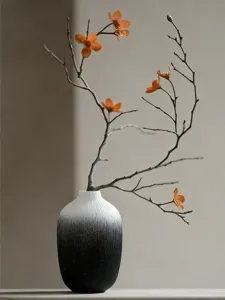 Minimalist black and white gradient vase detail, wabi-sabi dry branch flower arrangement decor.