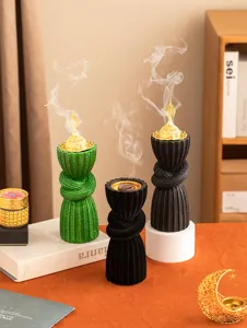 Exquisite Arabic style resin incense burner detail showcasing unique twisted column design.