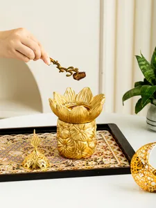 Golden Arabic incense burner set with tray, luxury metal cone and resin aroma holder for home decor.