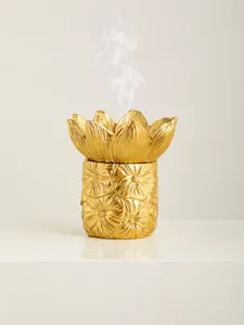 Golden flower shape incense burner Arabic cone incense holder elegant home fragrance decor.