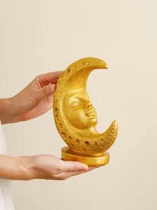 Exquisite vintage golden moon face resin sculpture tarot celestial decor detail shot