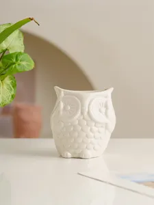 White ceramic owl candle holder ornament, perfect for home decor, tabletop display and cozy room.