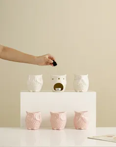 Ceramic owl oil burner set, cute tealight candle holder for home decor and party display.