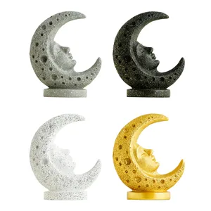 Resin moon face sculpture detail showing four color variants of medieval vintage celestial decor.