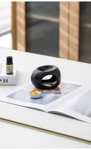 Bruciatore di oli essenziali in ceramica minimalista moderna supporto per candele yoga.