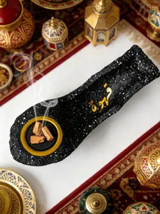 Resin boat incense burner with Arabic calligraphy, elegant desktop decoration craft item.
