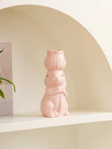 Pink ceramic rabbit flower vase detail showing glossy finish and bud head design for home decor.