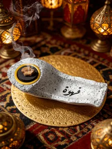 Resin flat boat incense burner with Arabic calligraphy, Middle Eastern style tabletop decor craft.