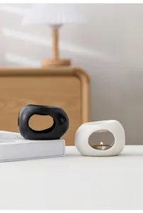 Bruciatore di essenze in ceramica minimalista moderno per aromaterapia e candele a casa.