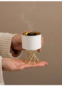 Modern Nordic ceramic incense burner with tall gold metal stand for home decor aroma