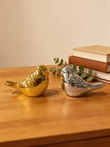 Ceramic little bird figurine detail, minimalist luxury home decor art ornament for desktop.