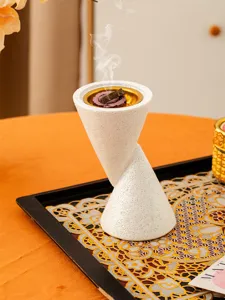 Double cone resin incense burner detailed view, elegant white glitter finish aromatherapy decor.