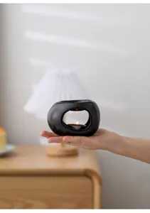 Bruciatore di oli essenziali in ceramica nera portacandele moderno per yoga e meditazione