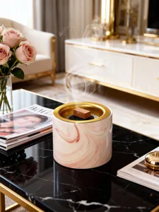 Luxus rosa Marmor Keramik Weihrauchbrenner mit goldenem Rand für moderne Heimdekoration.