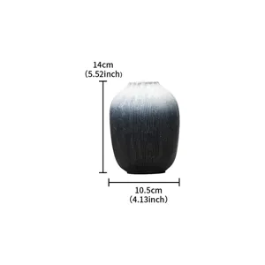 Minimalist black and white gradient resin vase, elegant wabi-sabi home decor ornament.