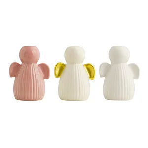 Ceramic angel candle holder set, modern minimalist home dining table wedding decor.