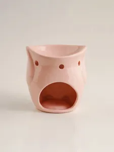 Pink ceramic owl oil burner detail shot, cute animal candle holder for home decor and gifts.