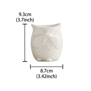 White ceramic three wise owls candle holder incense burner home decor detail view.