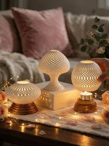 Ceramic hollow 3D printed candle holder detail, warm ambient light, elegant home decor.