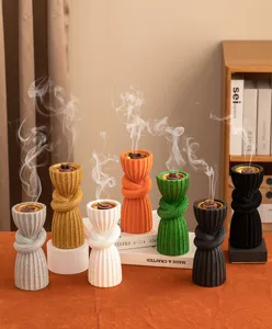 Detailed closeup of colorful resin knot incense burners showcasing exquisite multi-color variants.