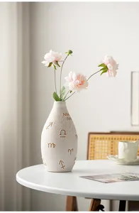Modern ceramic vase with gold constellation symbols, desktop flower arrangement decor