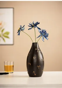 Modern ceramic vase for home decor, chic artistic desktop flower vessel with golden signs.