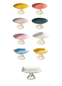 Modern minimalist ceramic jewelry tray with gold metal stand, multi-color desktop storage.
