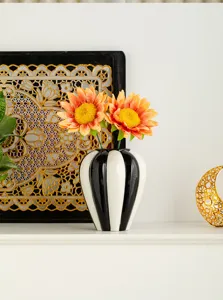 Nordic minimalist black white ceramic vase detail for home decor and floral arrangement display.