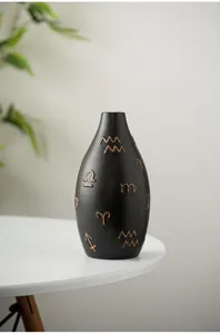 Modern black ceramic vase with engraved zodiac symbols, artistic desktop flower holder for home decor.