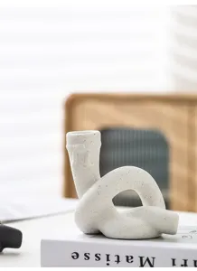 Bougeoir artistique minimaliste en céramique en forme de nœud pour décoration de maison