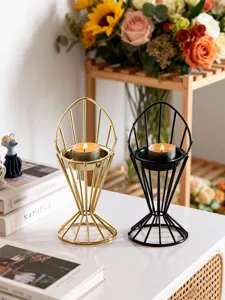 Modern minimalist metal candle holder set in gold and black for home decor and romantic ambiance.