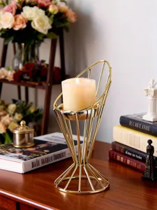 Modern minimalist gold geometric candle holder with scented pillar candle for home decor detail view