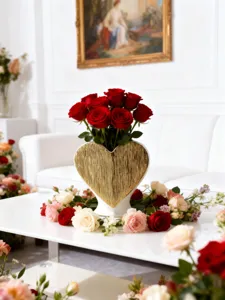 Heart ceramic vase with gold finish for romantic home living room flower decoration and styling.