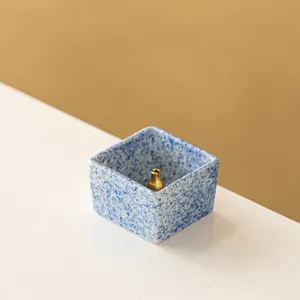 Minimalist square ceramic incense holder with brass insert, blue speckled mini aroma burner.